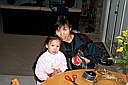 Mei and Jane busy making bows for the Christmas tree.